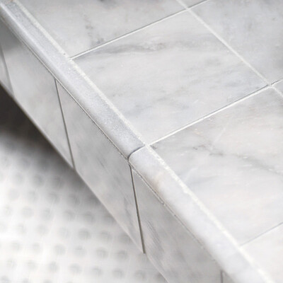 Avalon Polished Basket Weave Marble Mosaic 12×12 (MS00683) Glacier Honed Pencil Liner Marble Moldings 1/2×12 (ML00506) Avalon Polished Pencil Liner Marble Moldings 1/2×12 (ML00510) Avalon Polished Marble Tile 5 1/2×5 1/2 (TL13314)