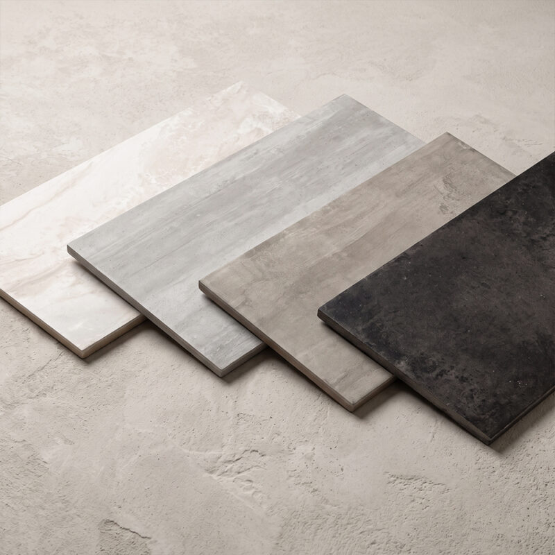 Weathered Black Matte Concrete Look Porcelain Tiles 12×24 (WIS11841) Melted Ice Matte Concrete Look Porcelain Tiles 12×24 (WIS11839) Sage Matte Concrete Look Porcelain Tiles 12×24 (WIS11840) Aqua Matte Concrete Look Porcelain Tiles 12×24 (WIS11838)