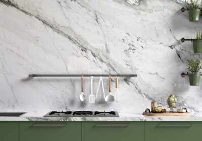White and green marble slab kitchen countertop island and backsplash