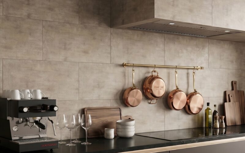 concrete look porcelain tile backsplash with black countertops