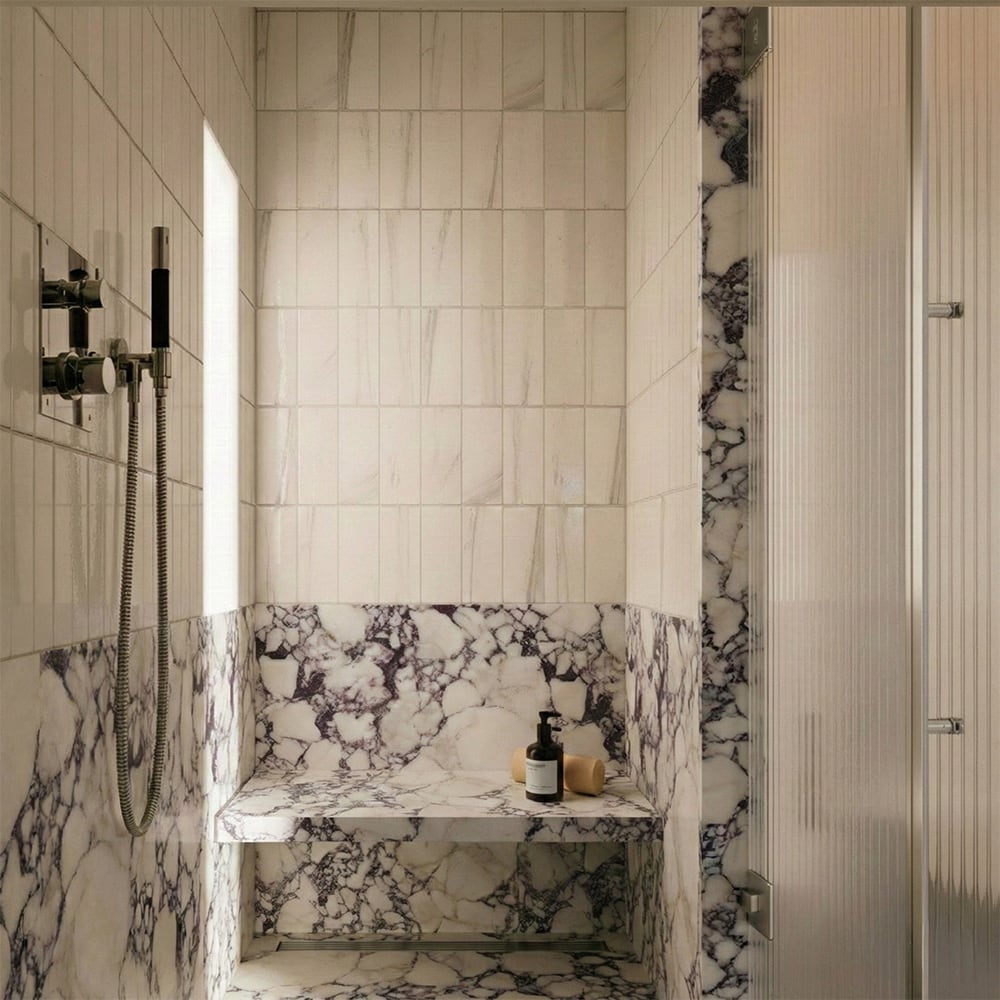 bianco marble subway shower wall design