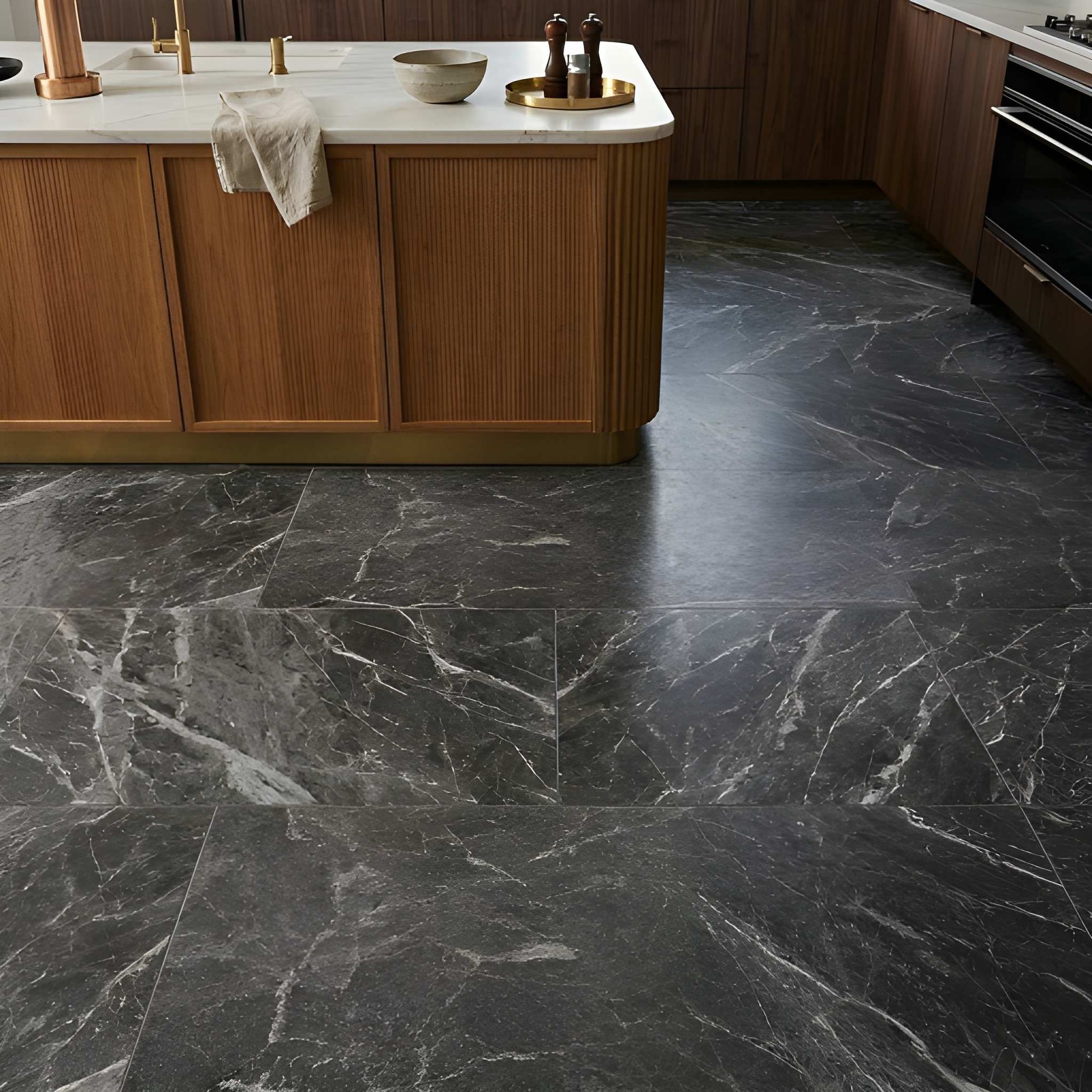 Luxurious kitchen design featuring Black Cottage Marble Tile flooring with dramatic white veining from a premium Marble Tile Supplier in Fairfax.