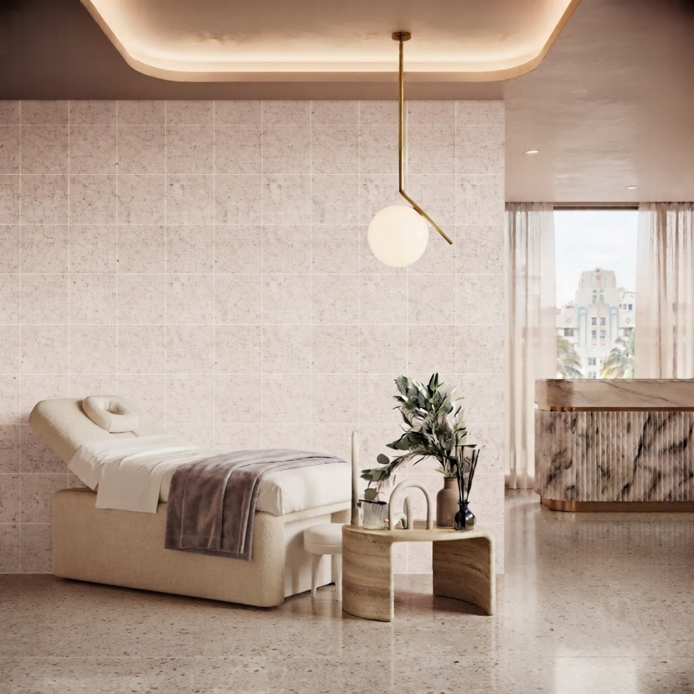 Soft matte terrazzo tile flooring and matching wall tiles in a luxury Miami spa room.